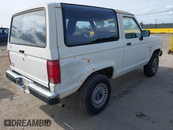 1986 Ford Bronco z VIN 1FMCU14T0GUC51692, wystawiony jako IAAI lot #41982392 z przebiegiem 509 734 mil mil oraz . Historia ofert i sprzedaży dostępna na DreamBid. Obrazek 4.