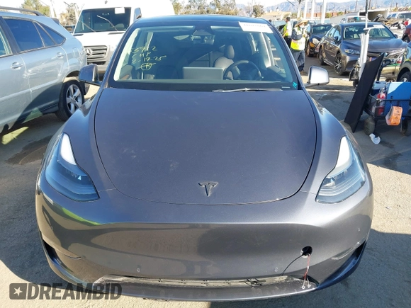 2022 Tesla Model Y Performance with VIN 7SAYGDEF7NF562895, listed as a IAAI auction lot 41692864 with 29,904 mi miles and . Bid and sale history available at DreamBid. Image 11.