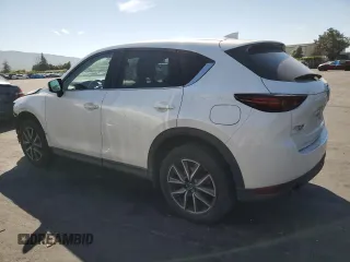 2017 Mazda CX-5 Grand Touring with VIN JM3KFBDL7H0202831, listed as a Copart auction lot 54943115 with 69,933 mi miles and Salvage Title. Bid and sale history available at carsss.com. Image 2.
