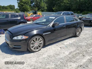 2014 Jaguar XJ Portfolio with VIN SAJWA2GZ2E8V66906, listed as a Copart auction lot 64888135 with 166,194 mi miles and Clean title. Bid and sale history available at DreamBid. Image 1.