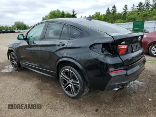 2015 BMW X4 xDrive35i with VIN 5UXXW5C55F0E87384, listed as a Copart auction lot 56299284 with 182,434 mi miles and Clean Title. Bid and sale history available at carsss.com. Image 2.