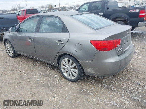 2010 Kia Forte SX with VIN KNAFW4A31A5048066, listed as a IAAI auction lot 42102810 with 160,998 mi miles. Bid and sale history available at carsss.com. Image 3.