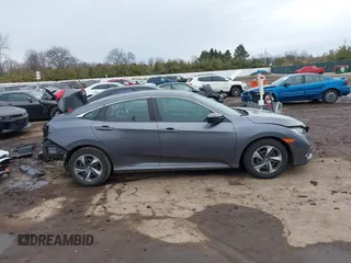 2021 Honda Civic Sedan LX with VIN 2HGFC2F6XMH500937, listed as a IAAI auction lot 41742963 with 39,660 mi miles. Bid and sale history available at carsss.com. Image 14.