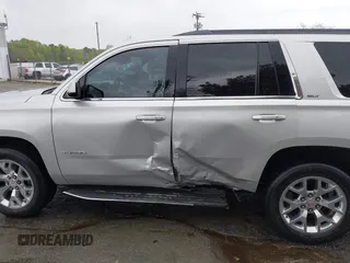 2015 GMC Yukon SLT with VIN 1GKS2BKC0FR676107, listed as a IAAI auction lot 41962929 with 132,389 mi miles. Bid and sale history available at carsss.com. Image 15.