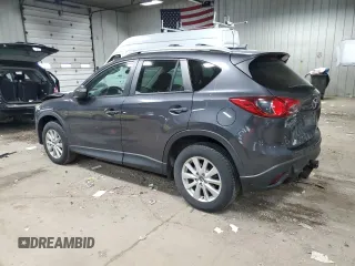 2016 Mazda CX-5 Touring with VIN JM3KE4CY9G0790872, listed as a Copart auction lot 54868385 with 82,569 mi miles and Clean Title. Bid and sale history available at carsss.com. Image 2.