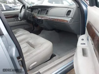 2005 Mercury Grand Marquis GS with VIN 2MEFM74W45X629662, listed as a IAAI auction lot 42075152 with 65,941 mi miles. Bid and sale history available at carsss.com. Image 5.