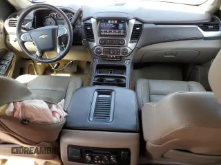 2015 Chevrolet Suburban LTZ with VIN 1GNSKKKC1FR659707, listed as a Copart auction lot 50202895 with 91,680 mi miles and Salvage Title. Bid and sale history available at DreamBid. Image 8.