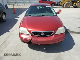 2000 Mercury Sable z VIN 1MEFM53U0YG640107, wystawiony jako Copart lot #56667855 z przebiegiem 146 403 mil mil oraz Szkody całkowita. Historia ofert i sprzedaży dostępna na DreamBid. Obrazek 5.