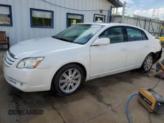 2006 Toyota Avalon XL with VIN 4T1BK36B16U089006, listed as a Copart auction lot 56031235 with 105,616 mi miles and Salvage title. Bid and sale history available at DreamBid. Image 1.