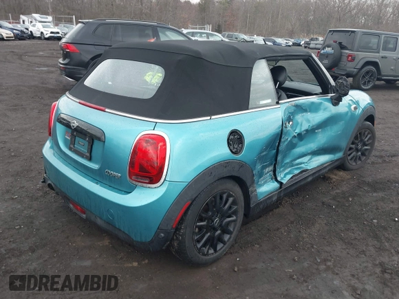 2019 MINI Convertible Cooper with VIN WMWWG5C52K3H08648, listed as a IAAI auction lot 41686314 with 40,728 mi miles and . Bid and sale history available at DreamBid. Image 4.
