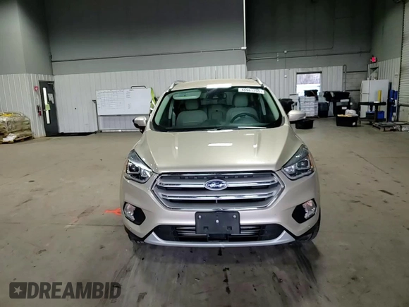2018 Ford Escape Titanium с VIN 1FMCU9J93JUC08799, выставлен на аукционе Copart как лот 48961795 с пробегом 78 127 миль миль и Списание • Salvage title. История ставок и продаж доступна на DreamBid. Изображение 11.