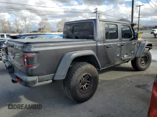 2021 Jeep Gladiator Rubicon with VIN 1C6JJTBG9ML512347, listed as a Copart auction lot 43197415 with 134,608 mi miles and Salvage title. Bid and sale history available at DreamBid. Image 3.