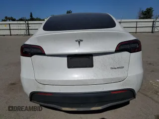 2022 Tesla Model Y Performance with VIN 7SAYGDEF9NF392197, listed as a Copart auction lot 57259105 with 43,400 mi miles and Salvage title. Bid and sale history available at DreamBid. Image 6.