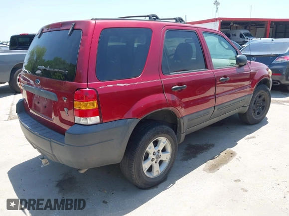2005 Ford Escape XLT with VIN 1FMYU031X5KE17077, listed as a IAAI auction lot 42260075 with 234,758 mi miles and . Bid and sale history available at DreamBid. Image 4.