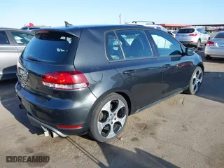 2012 Volkswagen GTI with VIN WVWHV7AJ6CW178615, listed as a IAAI auction lot 41975014 with 60,698 mi miles. Bid and sale history available at carsss.com. Image 4.