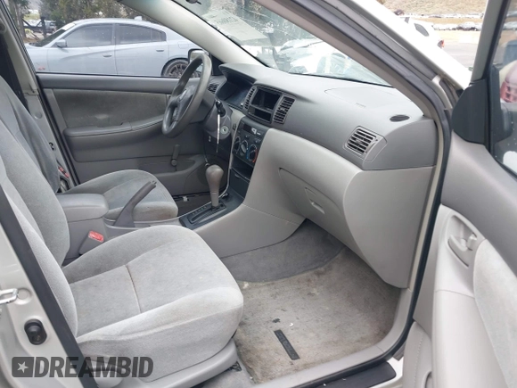 2004 Toyota Corolla CE with VIN 1NXBR32E24Z275615, listed as a IAAI auction lot 42180665 with 210,598 mi miles and . Bid and sale history available at DreamBid. Image 5.