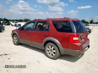 2005 Ford Freestyle SE with VIN 1FMZK01105GA54885, listed as a Copart auction lot 58414145 with 306,275 mi miles and Salvage title. Bid and sale history available at DreamBid. Image 2.