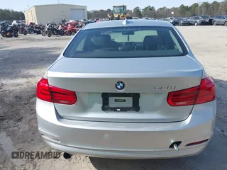 2018 BMW 3 Series 320i with VIN WBA8A9C55JAH14990, listed as a IAAI auction lot 41719896 with 77,472 mi miles. Bid and sale history available at carsss.com. Image 16.