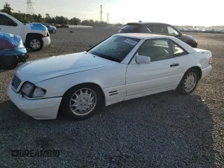 1997 Mercedes-Benz SL 500 with VIN WDBFA67FXVF149930, listed as a Copart auction lot 64749525 with 88,523 mi miles and Salvage title. Bid and sale history available at DreamBid. Image 1.