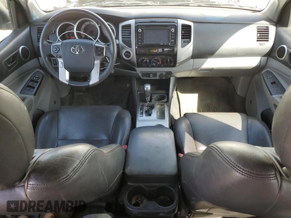 2014 Toyota Tacoma with VIN 3TMLU4EN7EM144839, listed as a Copart auction lot 52728065 with 32,610 mi miles and Salvage Title. Bid and sale history available at DreamBid. Image 8.
