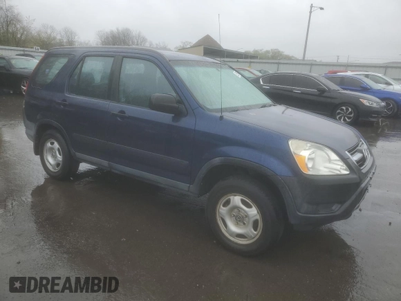2004 Honda CR-V LX with VIN SHSRD78474U252663, listed as a Copart auction lot 52090185 with 202,703 mi miles and Salvage Title. Bid and sale history available at carsss.com. Image 4.