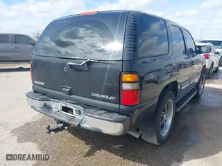 2004 Chevrolet Tahoe LT with VIN 1GNEC13Z74J323109, listed as a IAAI auction lot 41829422 with 261,636 mi miles. Bid and sale history available at carsss.com. Image 4.