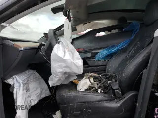 2021 Tesla Model Y Long Range z VIN 5YJYGDEE7MF093942, wystawiony jako Copart lot #54762425 z przebiegiem 20 492 mil mil oraz Szkoda całkowita • Salvage title. Historia ofert i sprzedaży dostępna na DreamBid. Obrazek 7.