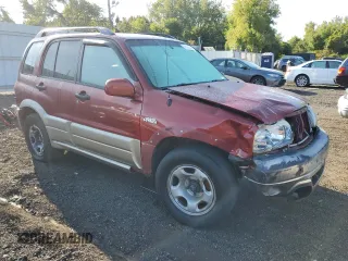 2002 Suzuki Grand Vitara JLX z VIN JS3TD62VX24151115, wystawiony jako Copart lot #71155924 z przebiegiem 264 639 mil mil oraz Szkoda całkowita • Salvage title. Historia ofert i sprzedaży dostępna na DreamBid. Obrazek 4.