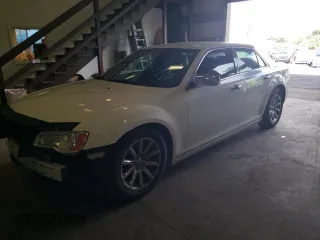 2012 Chrysler 300 with VIN 2C3CCAET0CH288782, listed as a Copart auction lot 46932215 with 191,879 mi miles and Salvage Title. Bid and sale history available at carsss.com. Image 1.