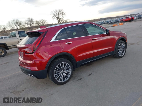 2024 Cadillac XT4 AWD Premium Luxury z VIN 1GYFZDR40RF102464, wystawiony jako IAAI lot #41968335 z przebiegiem 25 676 mil mil oraz . Historia ofert i sprzedaży dostępna na DreamBid. Obrazek 4.