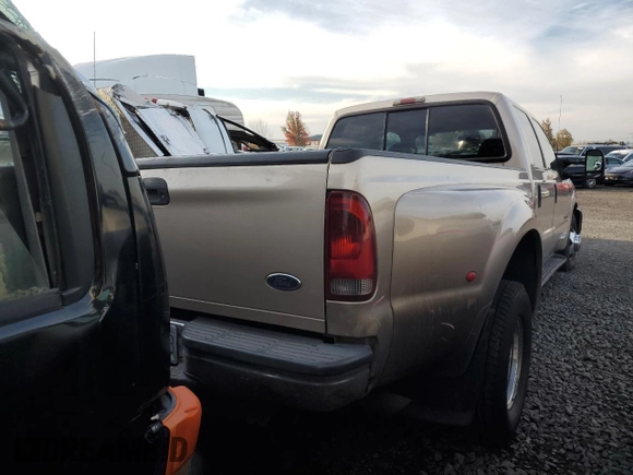 1999 Ford F-350 XL with VIN 1FTWW32F4XED06675, listed as a Copart auction lot 78982514 with 329,060 mi miles and Salvage title. Bid and sale history available at DreamBid. Image 3.