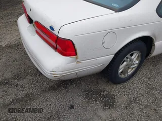 1996 Ford Thunderbird LX with VIN 1FALP6246TH160357, listed as a IAAI auction lot 41442234 with 99,815 mi miles and . Bid and sale history available at DreamBid. Image 6.