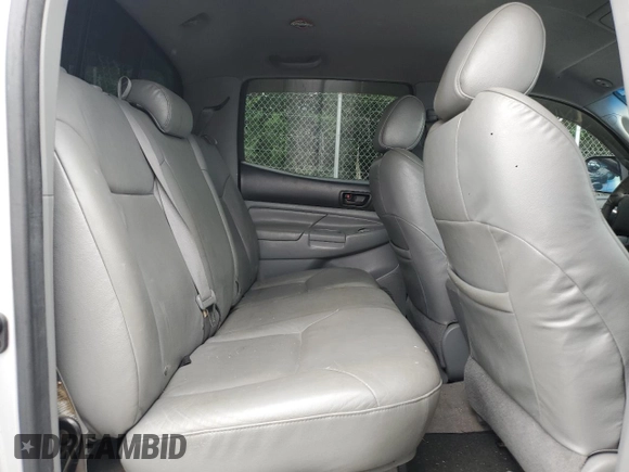 2007 Toyota Tacoma PreRunner с VIN 5TEJU62N97Z322084, выставлен на аукционе Copart как лот 59424435 с пробегом 214 053 миль миль и Чистый • Clean title. История ставок и продаж доступна на DreamBid. Изображение 10.