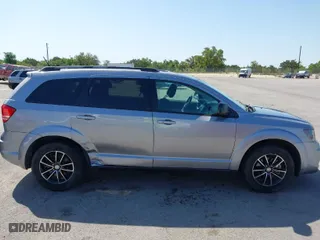 2017 Dodge Journey SE with VIN 3C4PDCAB1HT573511, listed as a IAAI auction lot 41984865 with 128,721 mi miles. Bid and sale history available at carsss.com. Image 13.
