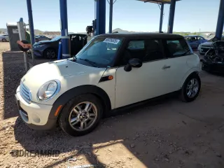 2012 MINI Hardtop z VIN WMWSU3C5XCT542244, wystawiony jako Copart lot #65226525 z przebiegiem 129 512 mil mil oraz Szkoda całkowita • Salvage title. Historia ofert i sprzedaży dostępna na DreamBid. Obrazek 1.