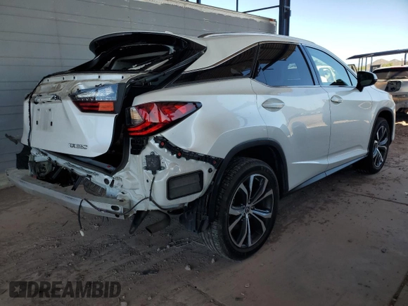2022 Lexus RX 350 with VIN 2T2HZMAAXNC244996, listed as a Copart auction lot 61692215 with 84,540 mi miles and Salvage title. Bid and sale history available at DreamBid. Image 3.