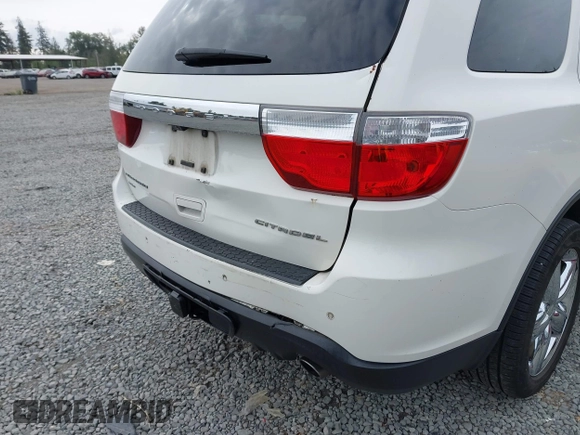 2012 Dodge Durango Citadel with VIN 1C4RDJEG8CC336957, listed as a IAAI auction lot 42309501 with 196,610 mi miles and . Bid and sale history available at DreamBid. Image 6.