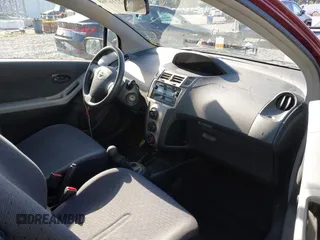 2009 Toyota Yaris with VIN JTDJT903295239611, listed as a IAAI auction lot 42216768 with 122,512 mi miles and . Bid and sale history available at DreamBid. Image 5.