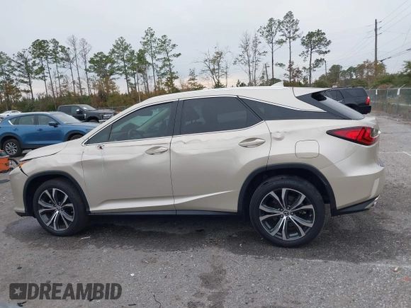 2018 Lexus RX with VIN 2T2ZZMCA9JC099803, listed as a IAAI auction lot 41052078 with 32,423 mi miles. Bid and sale history available at carsss.com. Image 14.