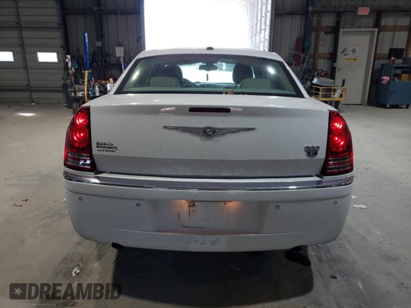 2010 Chrysler 300 with VIN 2C3CA6CT8AH329985, listed as a Copart auction lot 84556624 with 165,348 mi miles and Salvage Title. Bid and sale history available at carsss.com. Image 6.