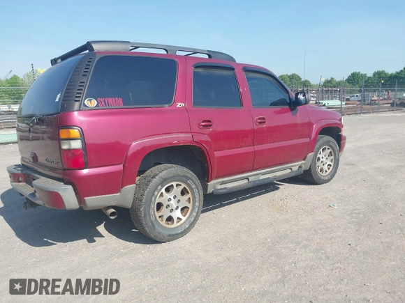 2004 Chevrolet Tahoe LS with VIN 1GNEK13Z94R252144, listed as a IAAI auction lot 42154641 with 201,247 mi miles. Bid and sale history available at carsss.com. Image 4.