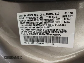 2010 Honda Odyssey Touring with VIN 5FNRL3H9XAB094779, listed as a IAAI auction lot 40412812 with 145,533 mi miles. Bid and sale history available at carsss.com. Image 9.