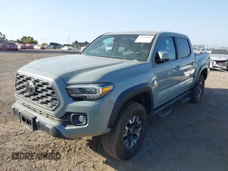 2022 Toyota Tacoma SR with VIN 3TMCZ5AN7NM501028, listed as a IAAI auction lot 42537868 with 42,186 mi miles and . Bid and sale history available at DreamBid. Image 6.