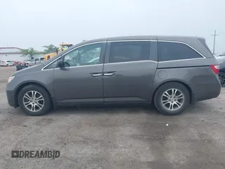 2011 Honda Odyssey EX-L with VIN 5FNRL5H64BB029087, listed as a IAAI auction lot 42508764 with 214,705 mi miles and . Bid and sale history available at DreamBid. Image 14.