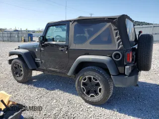 2014 Jeep Wrangler Sport with VIN 1C4AJWAG5EL192554, listed as a Copart auction lot 52501535 with 117,038 mi miles and Salvage Title. Bid and sale history available at carsss.com. Image 2.
