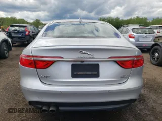 2017 Jaguar XF with VIN SAJBL4BN6HCY44054, listed as a Copart auction lot 55842675 with 124,273 mi miles and Salvage Title. Bid and sale history available at DreamBid. Image 6.
