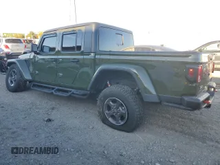 2021 Jeep Gladiator Rubicon with VIN 1C6JJTBM1ML599103, listed as a Copart auction lot 77084134 with 16,031 mi miles and Salvage title. Bid and sale history available at DreamBid. Image 2.