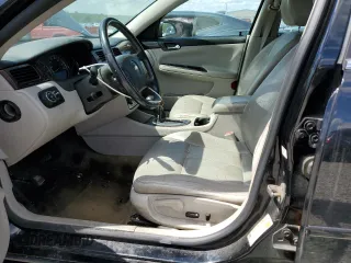 2014 Chevrolet Impala LTZ with VIN 2G1WC5E33E1164638, listed as a Copart auction lot 58699635 with 189,636 mi miles and Salvage title. Bid and sale history available at DreamBid. Image 7.