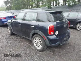 2011 MINI Countryman S z VIN WMWZC3C55BWL79422, wystawiony jako IAAI lot #42466982 z przebiegiem 104 392 mil mil oraz . Historia ofert i sprzedaży dostępna na DreamBid. Obrazek 3.