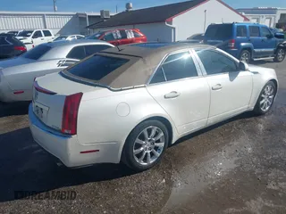2008 Cadillac CTS AWD with VIN 1G6DG577780129509, listed as a IAAI auction lot 41703785 with 144,440 mi miles and . Bid and sale history available at carsss.com. Image 4.